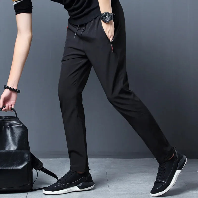 Calça casual masculina elástica, slim fit, cintura elástica, jogger, estilo coreano, clássica, azul, preta e cinza, tamanhos grandes