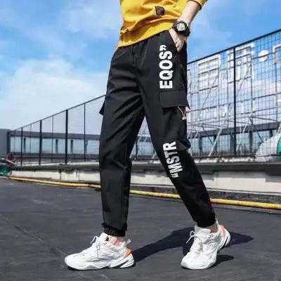 Calça Cargo Masculina com Vários Bolsos, Estilo Urbano, Ajuste Solto e Cordão