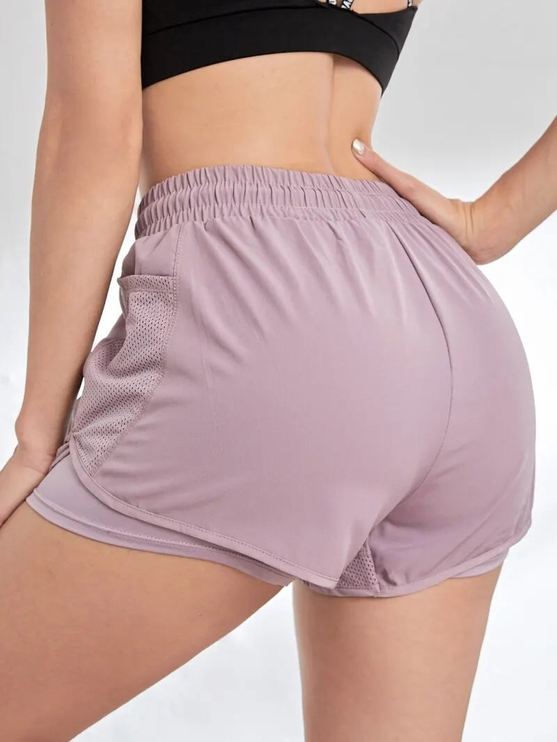 🌟 Shorts Esportivos Elásticos Femininos Com Bolsos — Liberdade em Forma de Movimento.