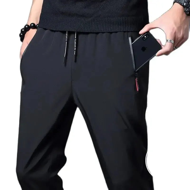 Calça casual masculina elástica, slim fit, cintura elástica, jogger, estilo coreano, clássica, azul, preta e cinza, tamanhos grandes