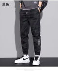 Calça Cargo Masculina com Vários Bolsos, Estilo Urbano, Ajuste Solto e Cordão
