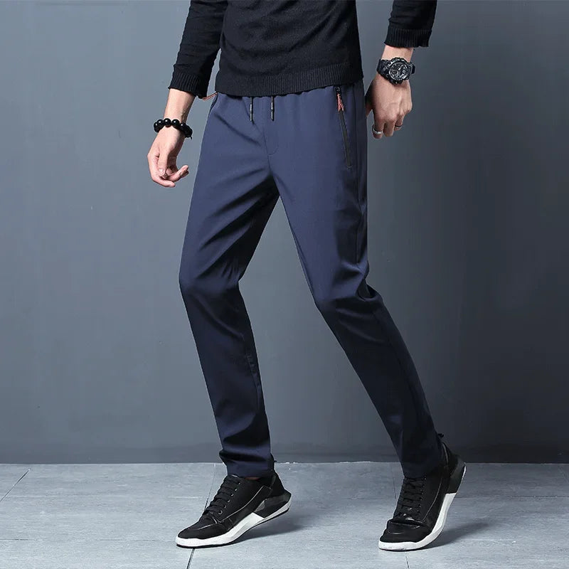 Calça casual masculina elástica, slim fit, cintura elástica, jogger, estilo coreano, clássica, azul, preta e cinza, tamanhos grandes