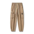 Calça Cargo Masculina com Vários Bolsos, Estilo Urbano, Ajuste Solto e Cordão